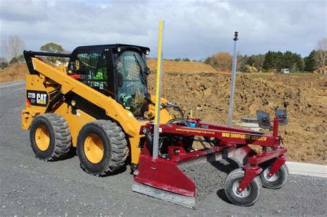 caterpillar skid steer grader attachment